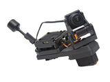 Side view of AtomRC gimbal with cylindrical camera housing and rectangular electronic module