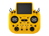 Yellow Radiomaster GX15 ExpressLRS radio controller with dual sticks and labeled switches