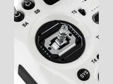 Close-up of silver knurled control stick assembly on white Radiomaster GX15 transmitter