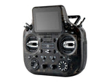 Radiomaster GX15 MAX smoke gray radio controller with curved ergonomic design and metallic joysticks