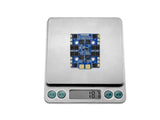Sequre Blueson A1 4-in-1 ESC weight on scale showing 18.7g with blue PCB