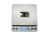 Lightweight Sequre ELRS receiver module weighing 1.5 grams on digital scale